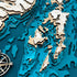 Close-up of Islesboro wooden map with layered islands and harbors
